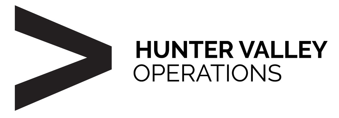 Hunter Valley Operations logo featuring a bold black chevron symbol beside the text ‘Hunter Valley Operations’.
